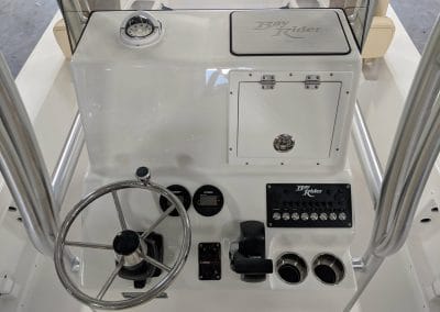 the controls and steering wheel of a bayrider boat