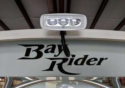 bay rider logo with headlights above it